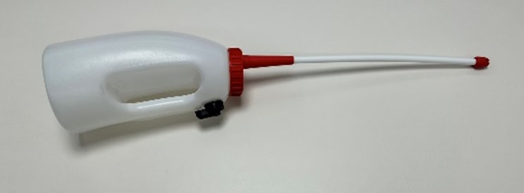 Drencher for feeding calves with a rigid probe